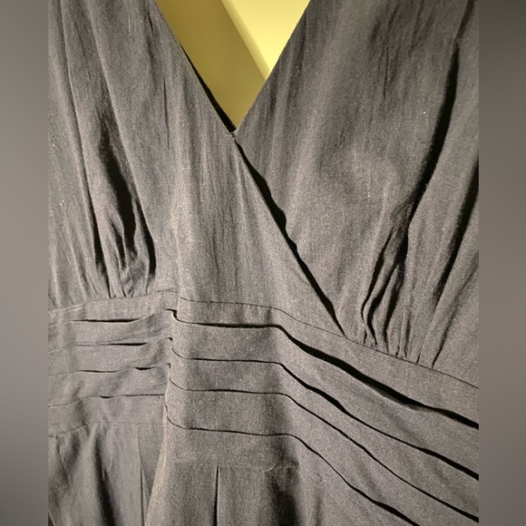 Navy blue V-neck, empire waist dress with floral-embroidered detail at bottom - Picture 2 of 5